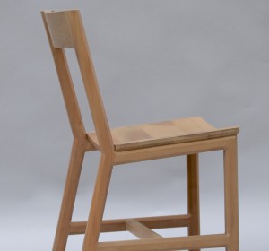 <span>Silla Nº06</span><i>→</i>
